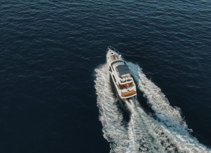 Yacht in full speed birds eye